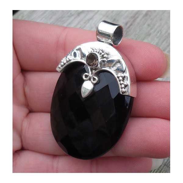Silver pendant set with oval faceted Onyx and round Smokey Topaz 
