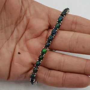 Zilveren armband gezet met zwarte Opalen