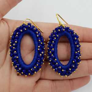 Goud vergulde glassberry oorbellen ovaal kobalt blauw