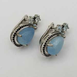 Zilveren oorbellen met Aquamarijn blauw Topaas en zwarte Spinel