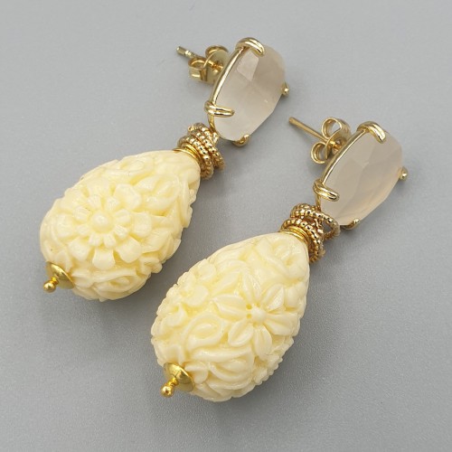 Vergulde oorbellen uitgesneden resin en Kattenoog