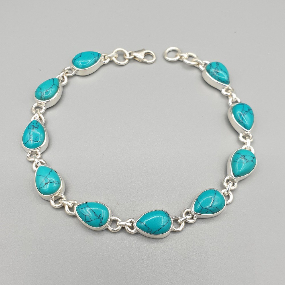 Zilveren armband met druppelvormige cabochon Turkoois