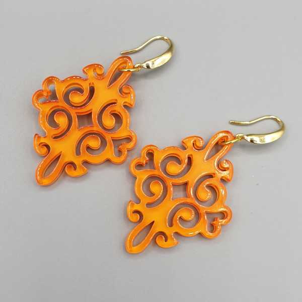 Earrings with orange resin pendant