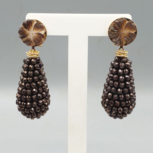 Vergulde oorbellen kristallen en schelp