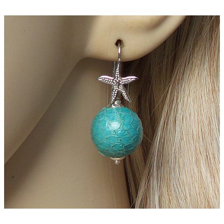Zilveren oorbellen met bol van turkoois Slangenhuid