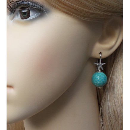 Zilveren oorbellen met bol van turkoois Slangenhuid