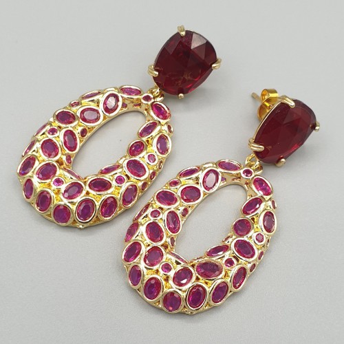 Vergulde oorbellen met rood crystal