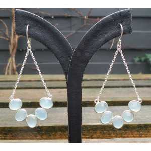 Silver long drop earrings set with faceted aqua Chalcedony