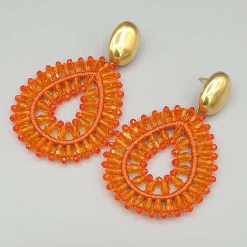Vergulde oorbellen met oranje druppelvormige hanger