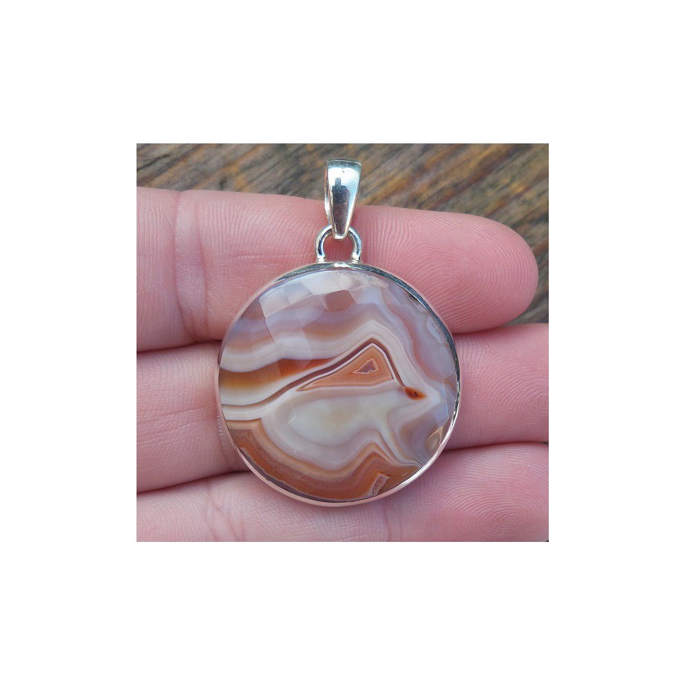 Silver pendant set with round faceted Laguna Lace Agate