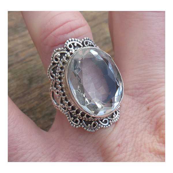 Silver ring set with white Topaz and crafted head 17 mm