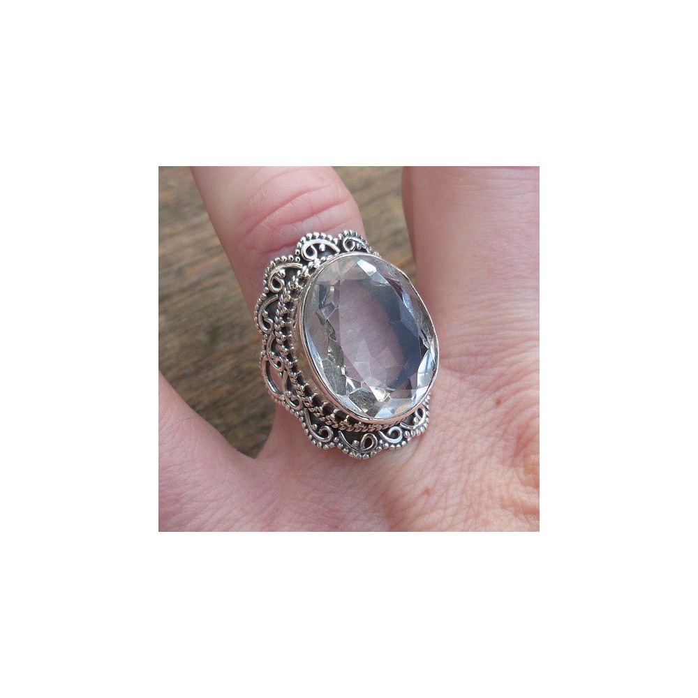 Silver ring set with white Topaz and crafted head 17 mm