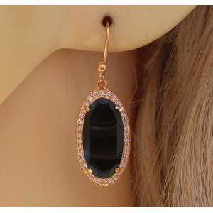 Gold plated earrings set with oval Onyx and Cz 