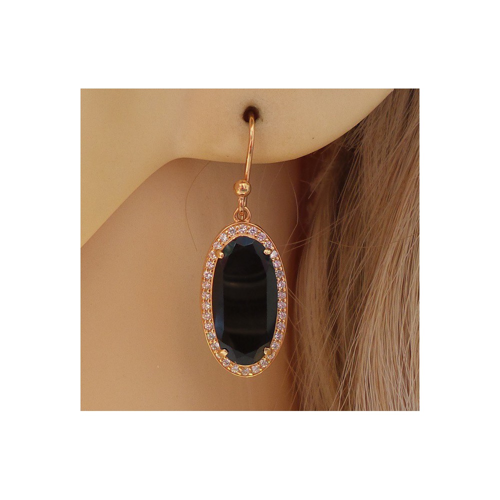 Gold plated earrings set with oval Onyx and Cz 