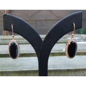 Gold plated earrings set with oval Onyx and Cz 