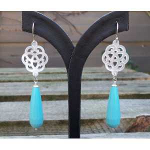 Silver earrings with carved mother of Pearl and Turquoise briolet