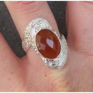 Silver ring set with oval faceted Carnelian 19 mm 