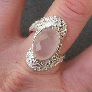 Silver ring set with oval facet cut rose quartz 