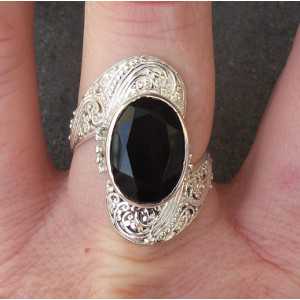 Silver ring set with oval facet cut Onyx 18 mm 