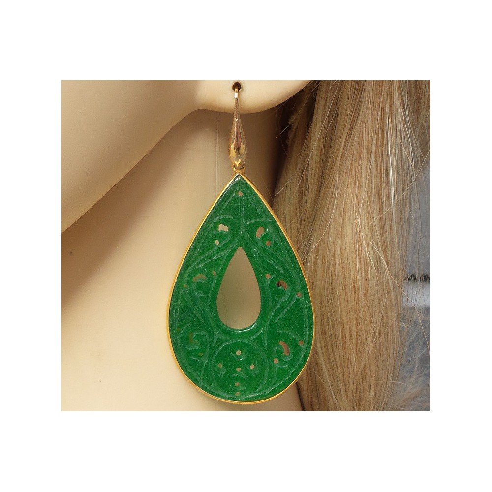 Gold plated earrings with large carved green Jade in frame 