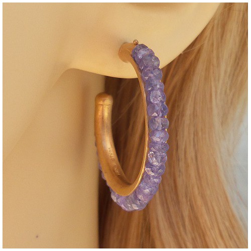 Vergulde zilveren creolen gezet met Tanzaniet