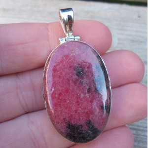 Silver pendant set with oval cabochon Rhodonite 