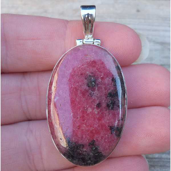 Silver pendant set with oval cabochon Rhodonite 