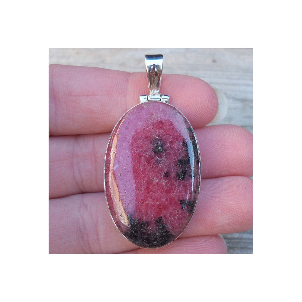 Silver pendant set with oval cabochon Rhodonite 