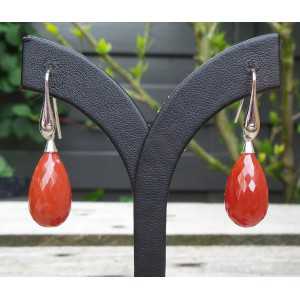 Silver earrings set with red Onyx briolet