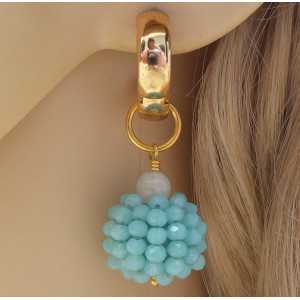 Gold creoles with a globe of blue crystal and Moonstone 