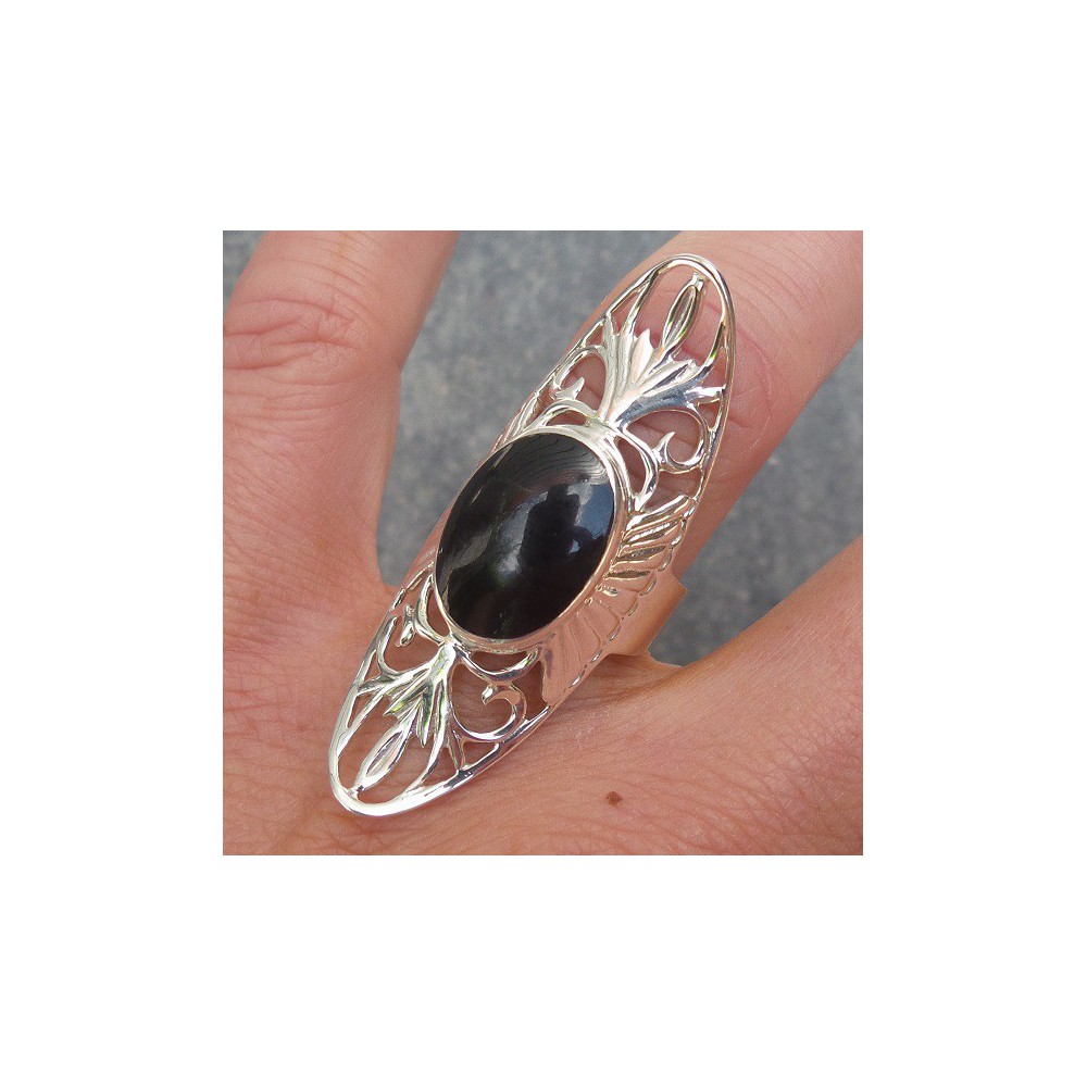 Silver ring with oval Onyx and open carved head 17.3