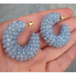 Gold-plated creoles of light blue Jade 