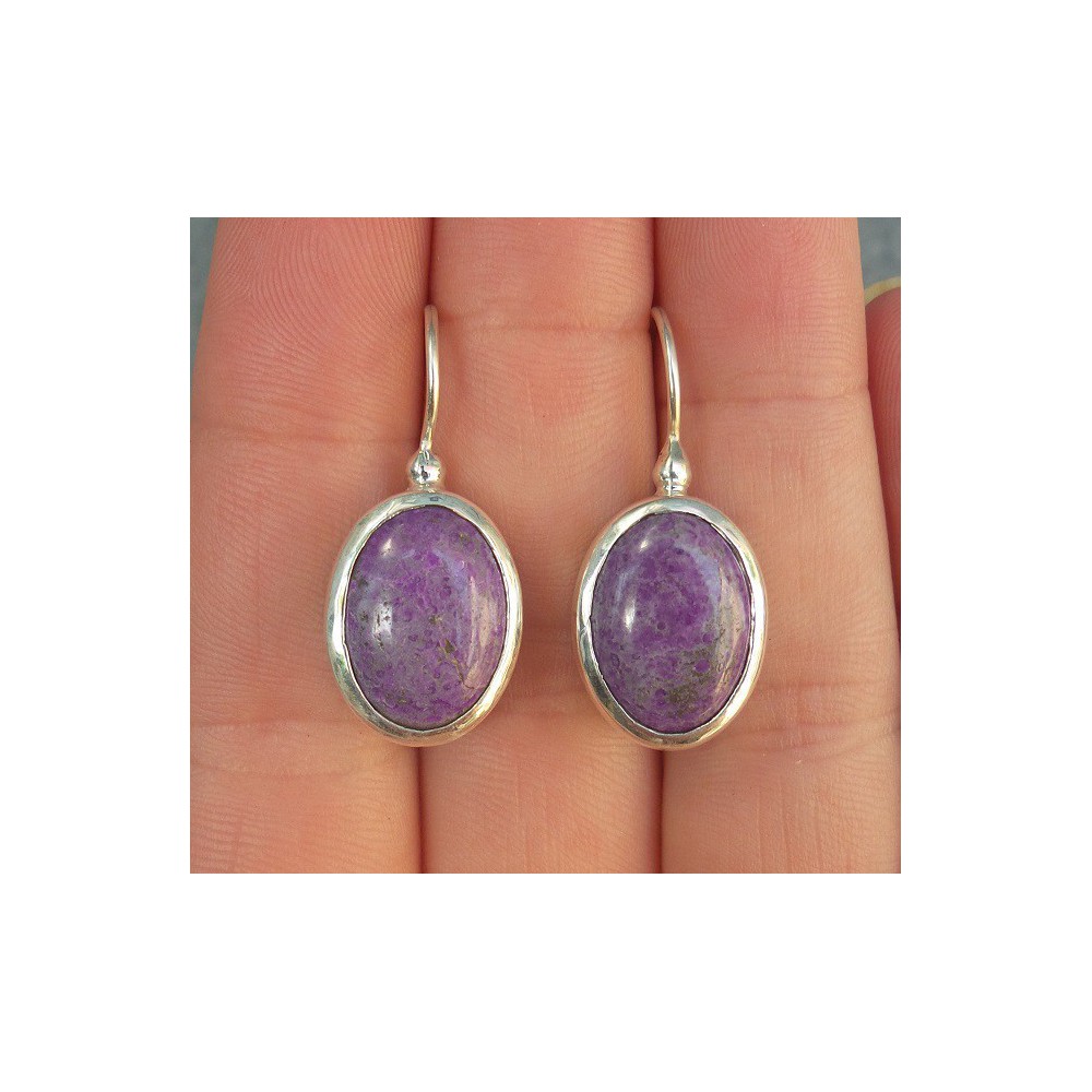 Silver earrings set with oval Sugiliet