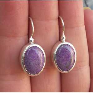 Silver earrings set with oval Sugiliet