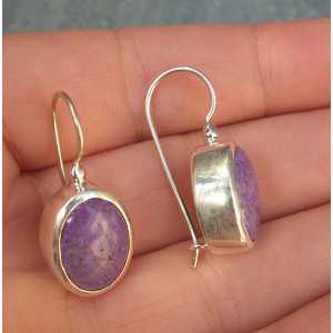 Silver earrings set with oval Sugiliet
