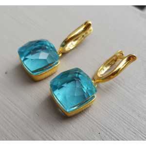 Gold plated earrings with square blue Topaz