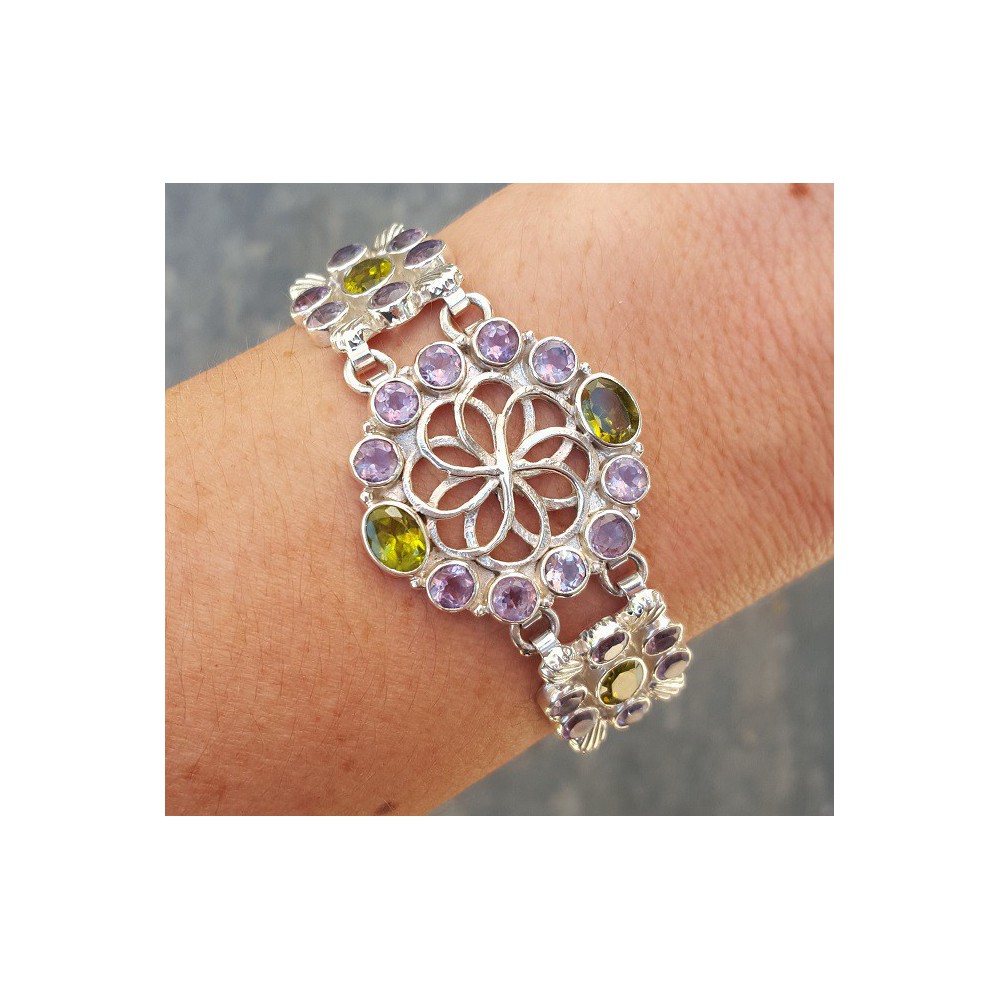 Silver bracelet set with facet cut Amethisten and Peridot