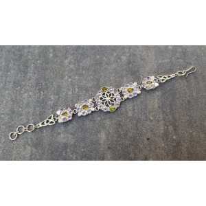 Silver bracelet set with facet cut Amethisten and Peridot