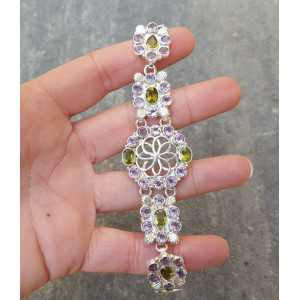 Silver bracelet set with facet cut Amethisten and Peridot
