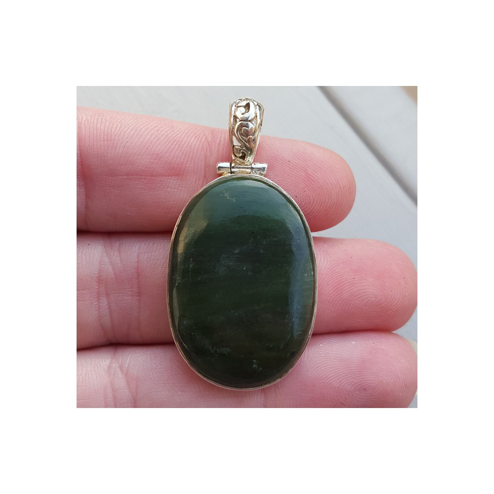 Silver pendant set with oval Jade