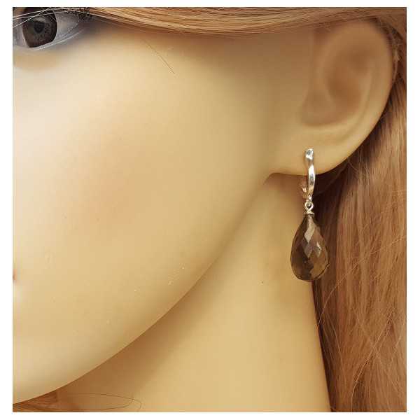 Silver earrings set with Smokey Topaz briolet