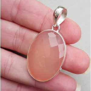 Silver pendant set with oval facet cut pink Chalcedony