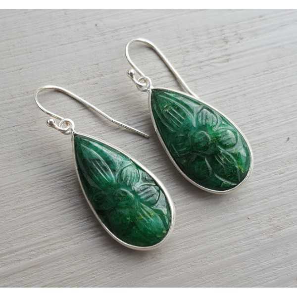 Silver earrings with carved Emerald