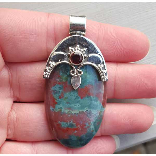 Silver pendant set with oval Bloodstone and round Garnet
