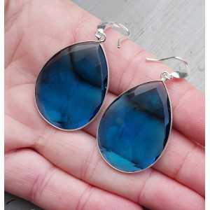 Zilveren oorbellen gezet met grote blauwe Topaas quartz