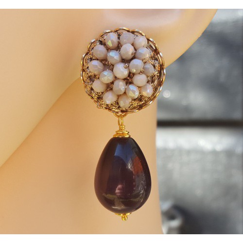 Goud vergulde oorbellen met paarse Kattenoog