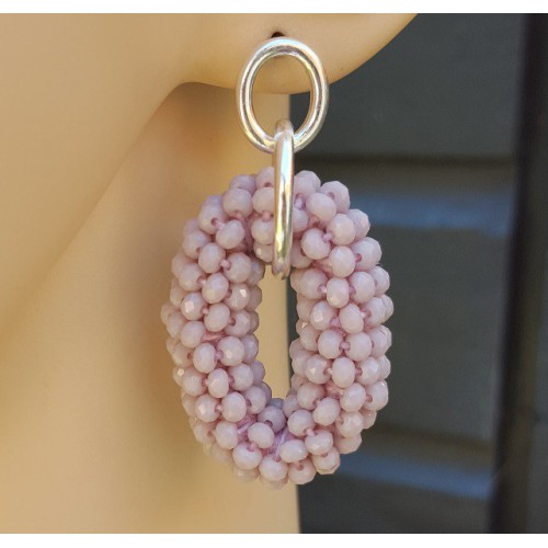 Zilveren oorbellen met ovale hanger van lila paarse kristallen