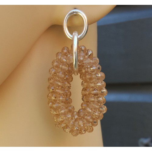 Zilveren oorbellen met champagne kleurige ovale hanger