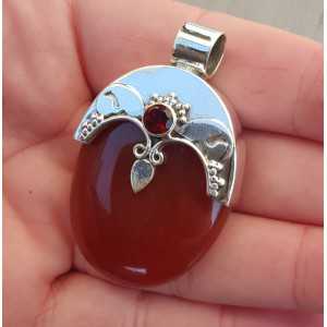 Silver pendant set with oval Carnelian, and round facet Garnet