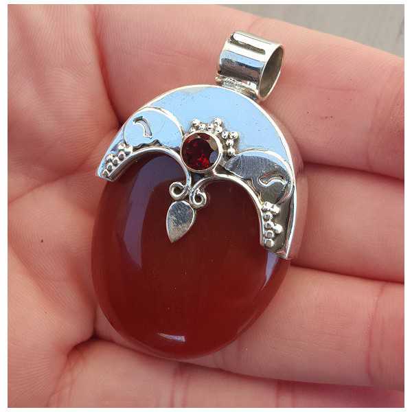 Silver pendant set with oval Carnelian, and round facet Garnet
